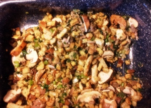 Then mix in sliced mushrooms, chopped spinach, wild rice and barley... I prefer stuffing that is not "wet."